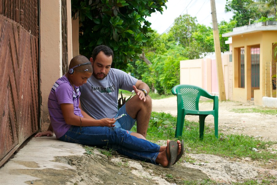 Field surveyor conducting interviews