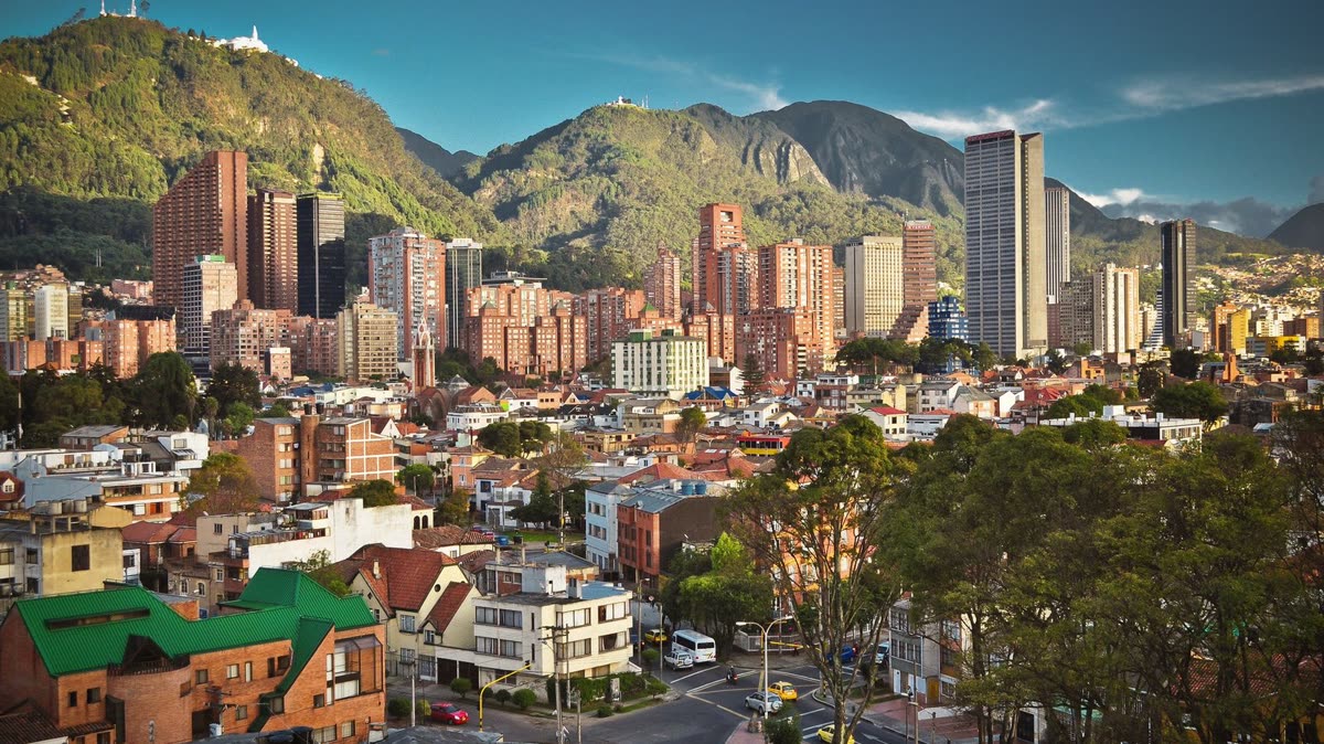 Bogot&aacute; cityscape for LUCI cross-city childcare access work